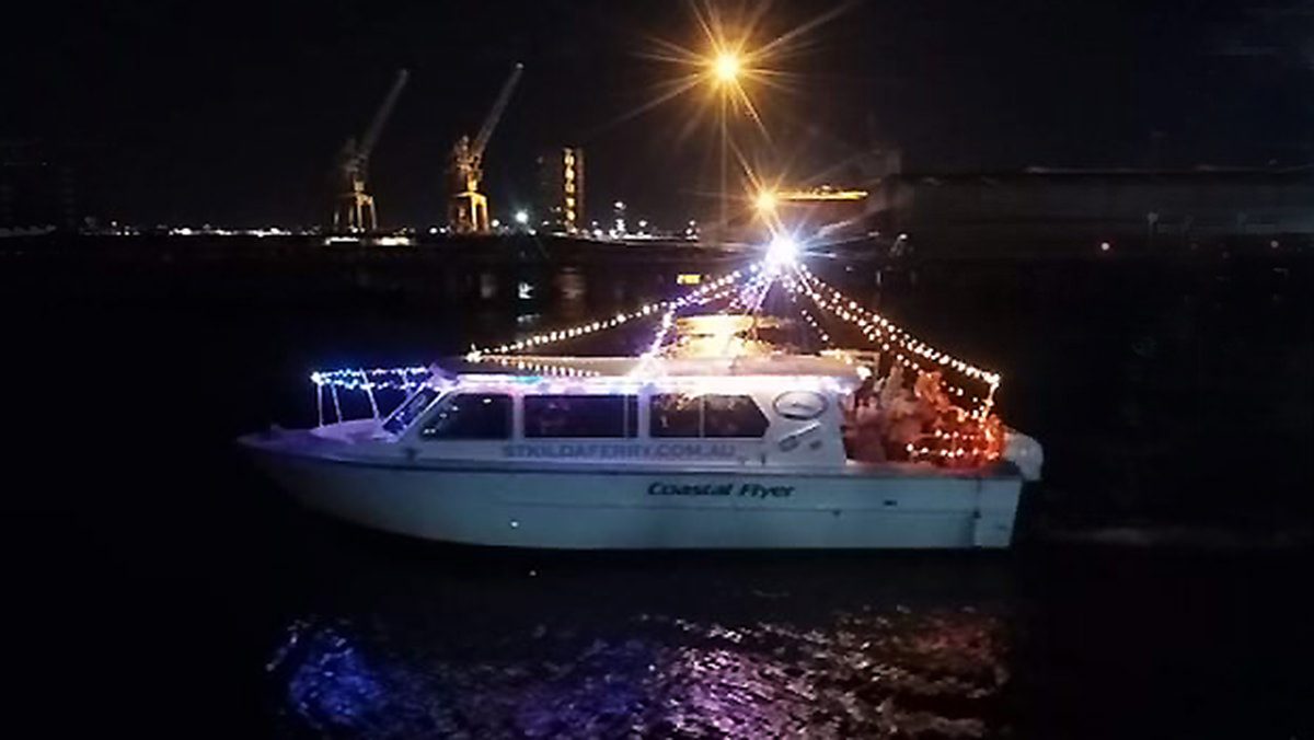 Revellers aboard the St Kilda Ferry returning from the New Years Eve Fireworks